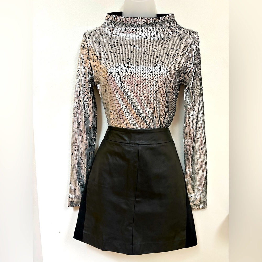 Stunning genuine leather black mini skirt by Paige, size medium
